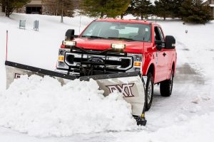 2020 Ford F-Series truck plowing snow